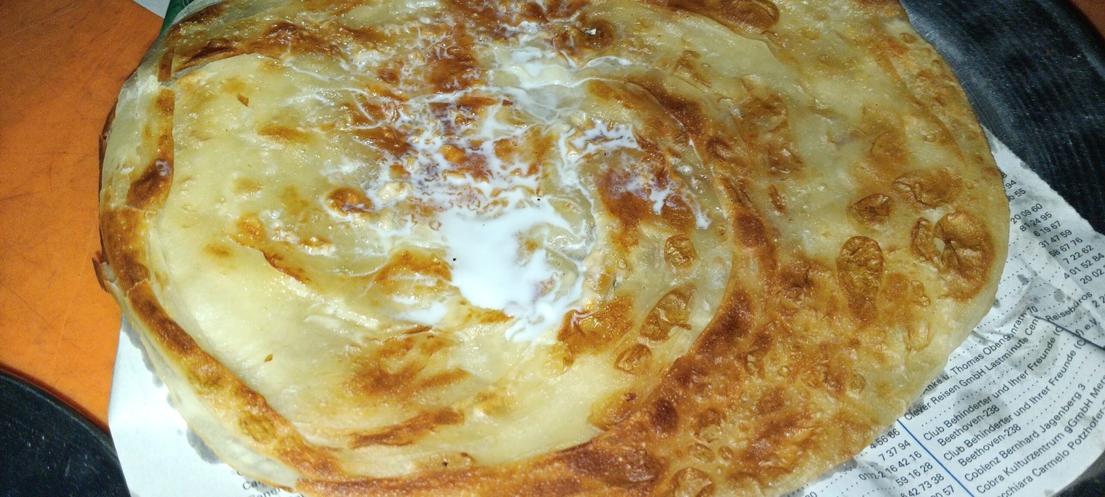 Crisp, layered paratha — Karachi’s timeless comfort food served hot with chai or yogurt.